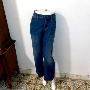 A little tear at the pocket loose fit jeans